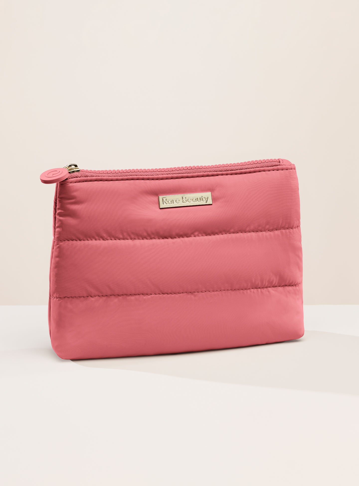 ecomm puffy makeup bag happy.jpg ecomm puffy makeup bag happy.jpg